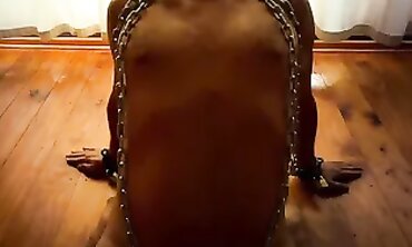 Dominatrix April's Rough Caning Lesson for Her Submissive Girlfriend