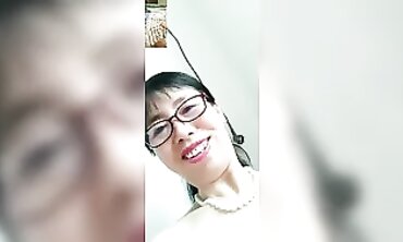 60-Year-Old Mature Asian Woman With Younger Boyfriend On Webcam