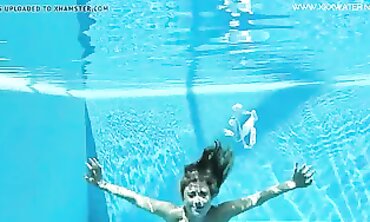 Blonde Lindsay Cruz Swims Nude in the Pool