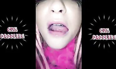Blonde Cosplay Girl Salivating and Munching on Cum