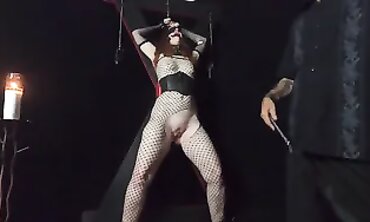 Redhead MILF Bound to St. Andrew's Cross for Rough Orgasm
