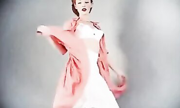 Ginger Striptease in Retro Fashion and Stockings