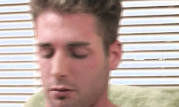 Boy with muscly build wanks his stiffy in yam-sized tabouret while perving at viewer.