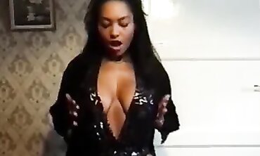 Beauty's Sensual Striptease with Big Boobs