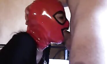 Laura On Heels Gives Deep Throat Blowjob in Red Mask
