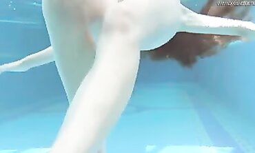Irina Russaka Strips Nude for a Solo Pool Swim