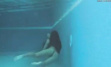 Irina Russaka Strips Nude for a Solo Pool Swim