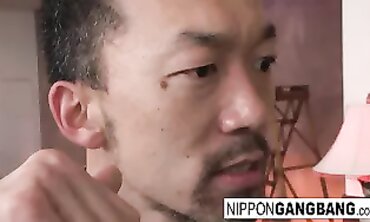Asian Brunette Squirts and Gets Gangbanged