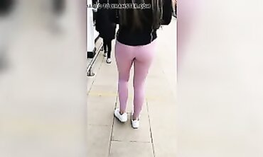 Pink Brunette Shows Off Amazing Booty in Rosy Leggings