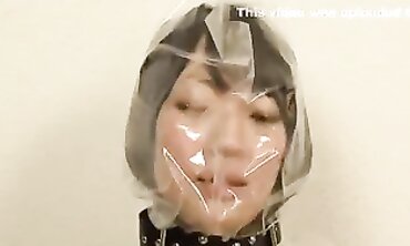 Adorable Japanese Bimbos in Latex Breathplay