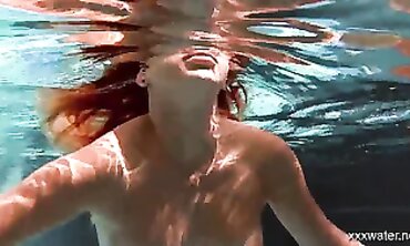 Stefanie Moon and Olla Oglaebina Swim Naked in the Pool