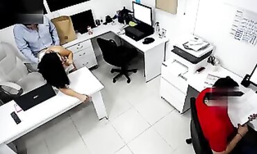 Boss Screws Coworker Next to Assistant
