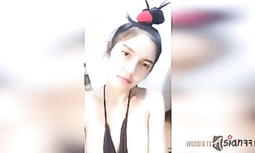 Thai Nymph Joy Masturbates at Home