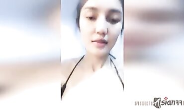 Thai Nymph Joy Masturbates at Home
