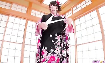 Japanese Brunette in Kimono Receives Oral Pleasure at Home