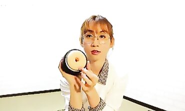 AB046 Asian Secretary Unboxes and Tests a Fresh Masturbation Machine