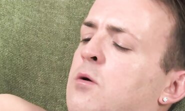 Boy with 2 earings drains off and spunks all over his abdomen.