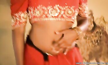Voluptuous Indian MILF Teases in Sensual Bollywood Showcase