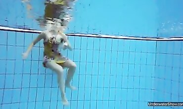 Brunette Milana Voda Swims Nude in the Pool