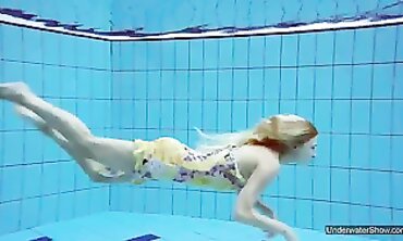 Brunette Milana Voda Swims Nude in the Pool