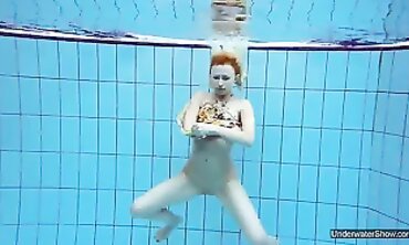 Brunette Milana Voda Swims Nude in the Pool