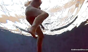 Brunette Milana Voda Swims Nude in the Pool
