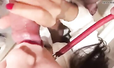 Crimson-Lipped Bimbo Deepthroats XXL Cock on a Leash