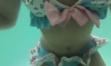 Petite Stepdaughter Caught Swimming in Bikini