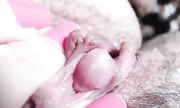 Ultra Close-Up of Hairy MILF's Slippery Pussy