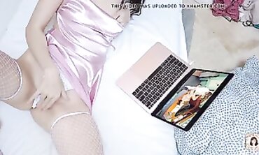 Bombshell Enjoys Lingerie While Watching Porn
