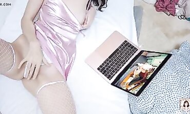 Bombshell Enjoys Lingerie While Watching Porn