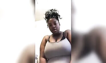 Ebony Busty Beauty Squeezes Milk From Her Giant Melons