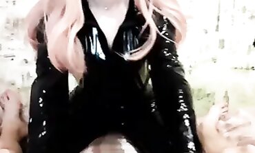 Pink and On in Latex: Deepthroat a Massive Cock