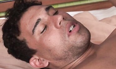Blowjob act inbetween 2 latino fellows in couch.
