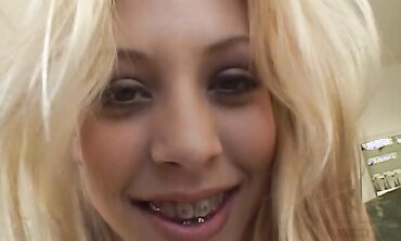 Leah Luv Reaches Back And Guides A Meaty Dark-Hued Salami Into Her Taut Fuckbox