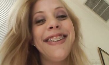 Leah Luv Reaches Back And Guides A Meaty Dark-Hued Salami Into Her Taut Fuckbox