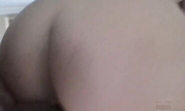 Melissa Lauren Looks Into The Camera As She Munches And Fellates A Ebony Man Rod