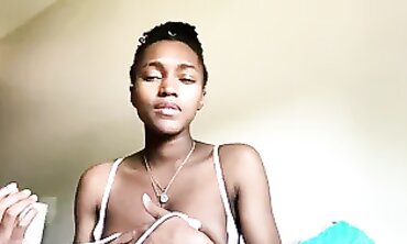 Adorable barely legal Ebony Girl Pumps Her Boobs