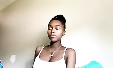 Adorable barely legal Ebony Girl Pumps Her Boobs