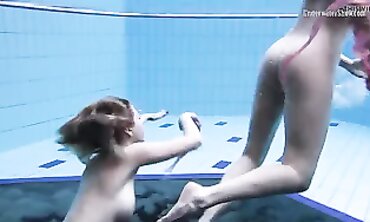 Andrejka and Aneta Swim Nude in the Pool