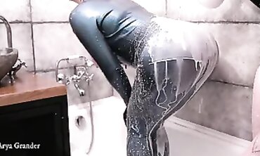 Love & Joy: Scorching Dyke Restroom Play in Latex Catsuits
