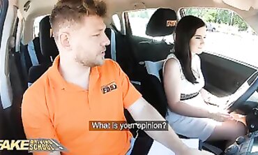 College-Aged Brunette Offers POV Blowjob in Fake Driving School