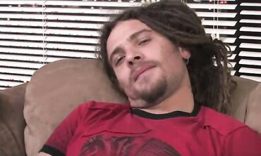 Inked boy with lengthy fears and Prince Albert piercing jacks himself in bedroom.