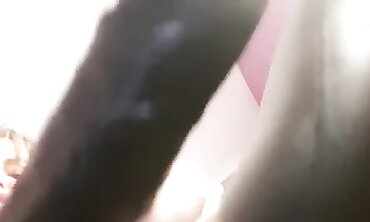 Blonde Domme in Latex High Heels Forces Gimp to Lick Cum