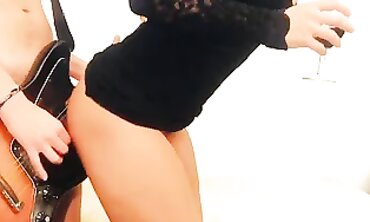 Sensuous Cougar Striptease in Minidress with Guitar Play