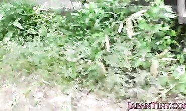 Petite Japanese Teen Takes On A Gang Outdoors