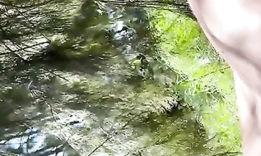MILF Gets Outdoor Handjob in Public with Spectators