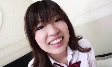 Stunning Japanese black-haired Ai Okada lets beau jism inwards her after supreme romp
