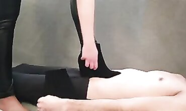 Blonde MILF Tramples Feet in Ankle Boots at Soiree
