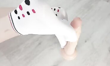 Russian Milf Milky Gives Devilish Sock Footjob to Giant Dick